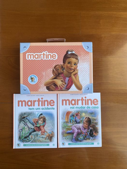 Livros e mala martine- martine vai mudar de casa, tem um acidente