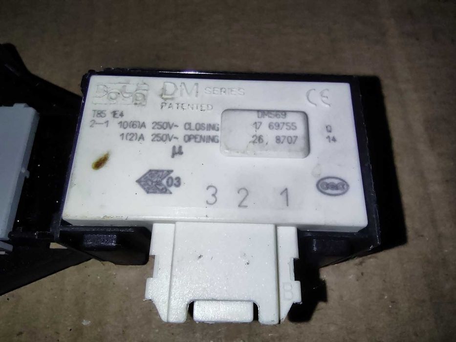 Замок DM 569 люка двери машинки Whirlpool AWS 61212