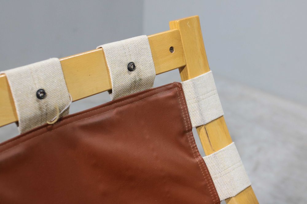 Poltrona Oddvin Rykken em faia e couro