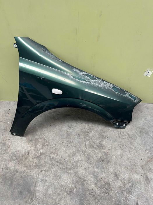 Guarda-Lamas Direito OPEL Astra G