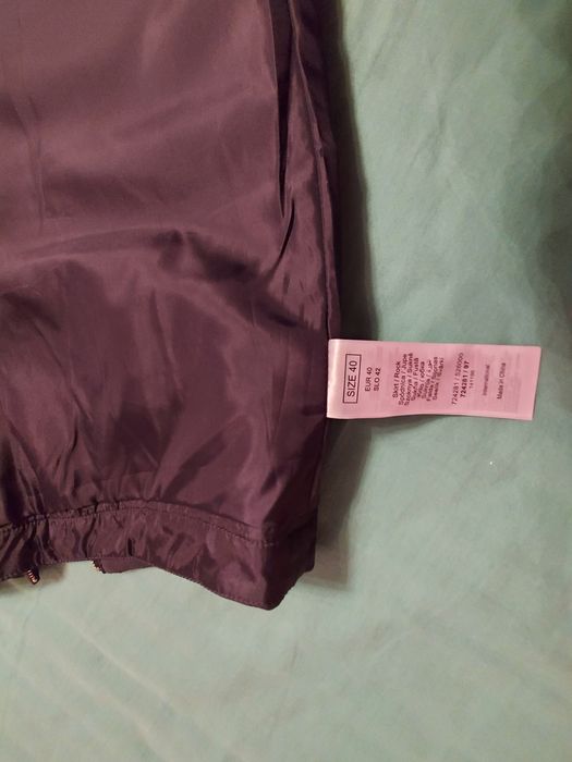 Шкіряна спідниця-міді