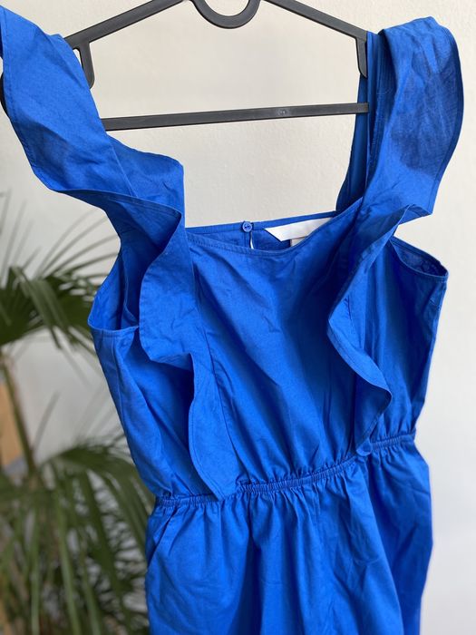 Kombinezon niebieski z falbanami M krótkie spodenki na ramiączkach H&M