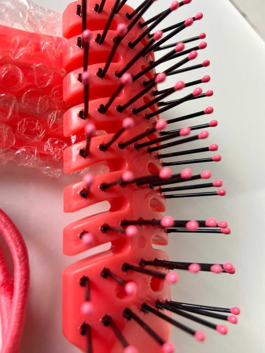 Conjunto escova e molas de cabelo