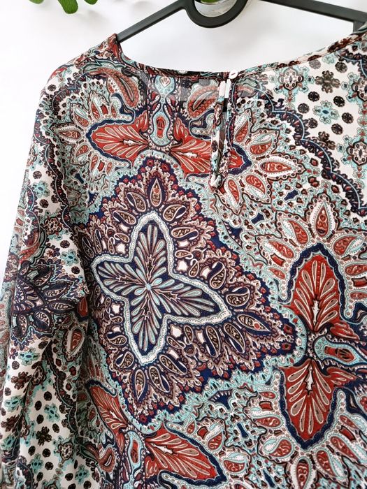 Blusa Fina com Cornucópias