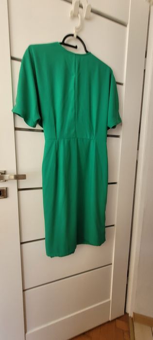 Aktualne. Elegancka zielona sukienka 40/ 42