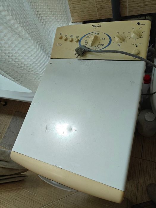 Вертикальна пральна машина