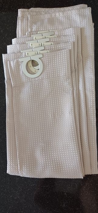 Varões e cortinas de casa de banho