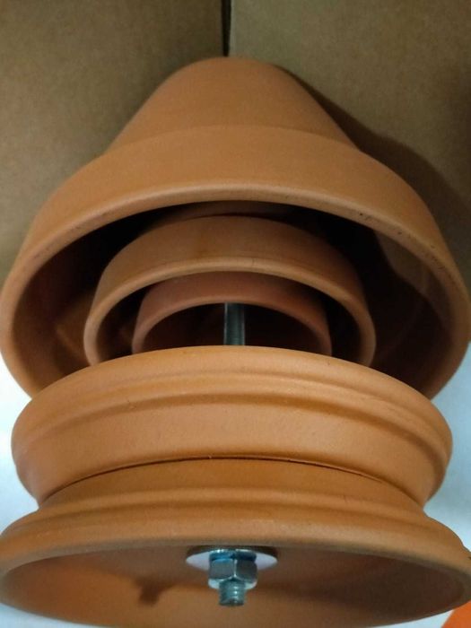 Kominek z doniczek ceramicznych