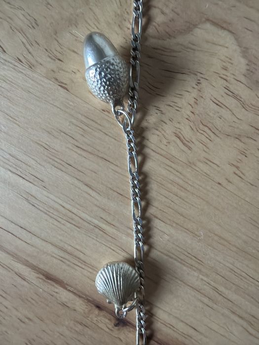 Pulseira de prata com berlocos- nova