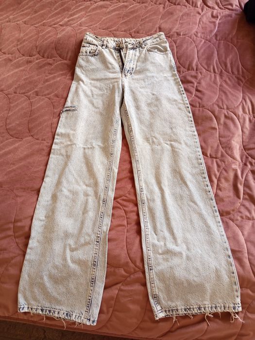 Джинси широкі світлого кольору