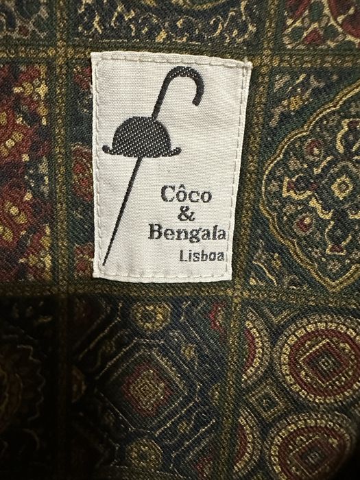 Parca bege coco e bengala