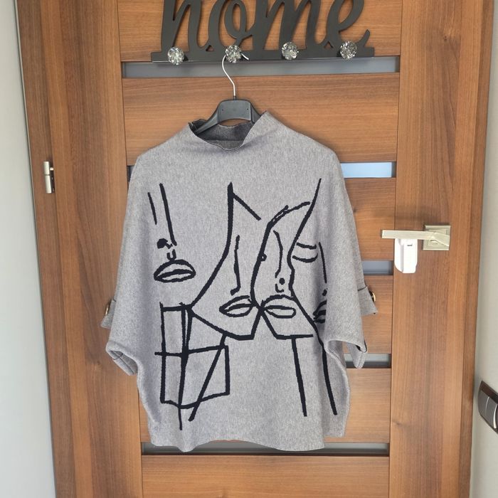Sweter damski twarze