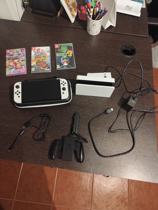 Nintendo switch OLED + 3 jogos