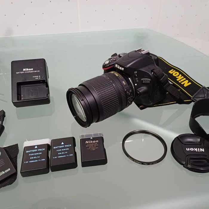 Nikon D5100 + 18-105 mm