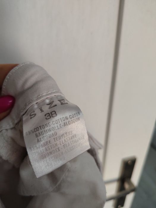 Spodnie jeansowe dżinsowe  elastyczne wysoki stan białe M goodies kies