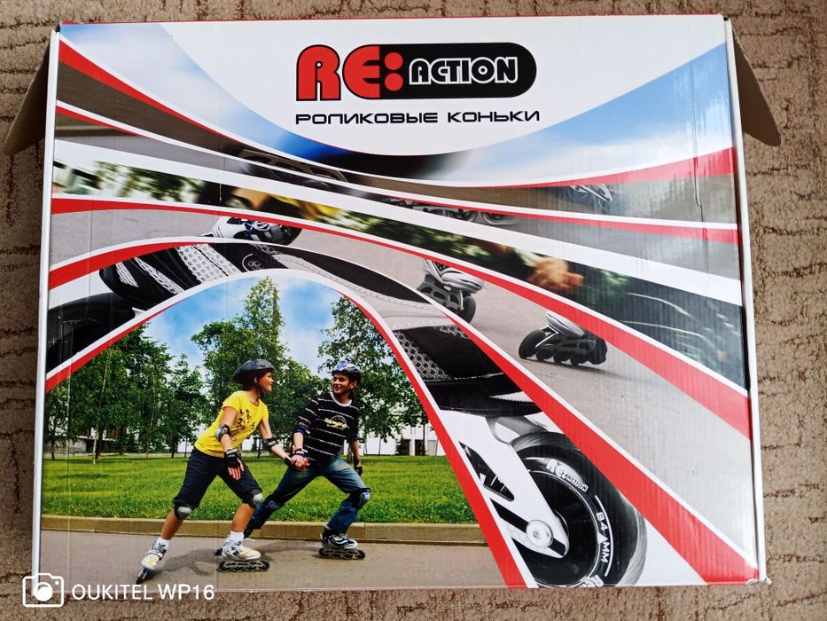 Роликовые коньки . Новые