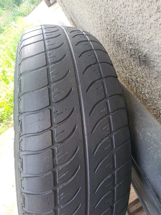 Продам фирменное колесо R13 4x100 Daewoo с шиной 175.70.