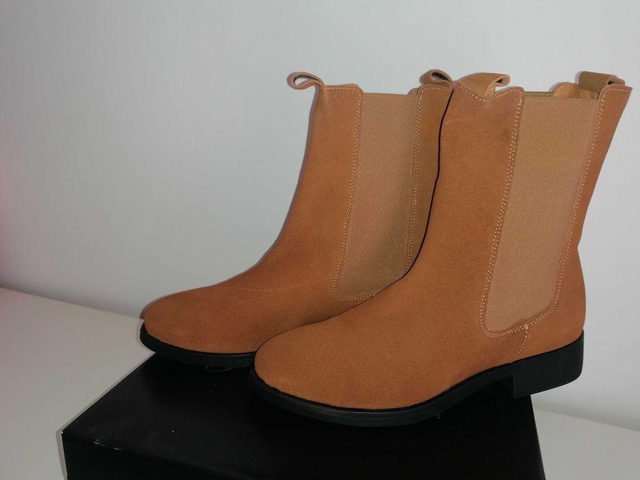 Botas novas pele genuína