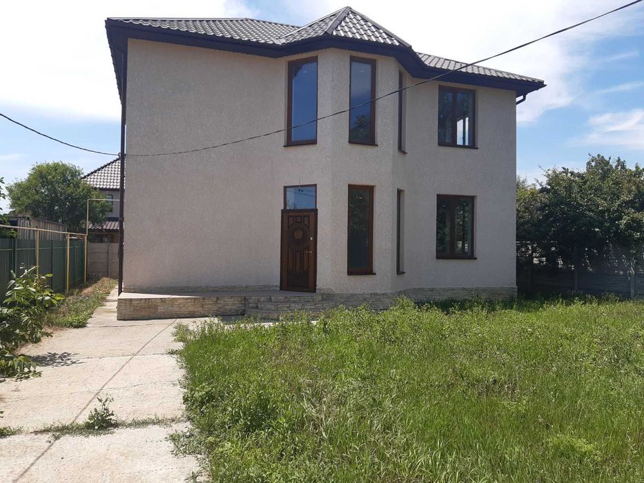 Червоный хутор дом из Крымского ракушечника в центре поселка.