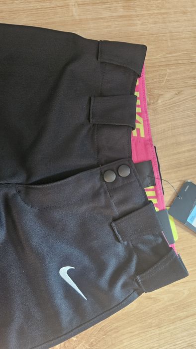 Spodnie sportowe rybaczki Nike slim fit S