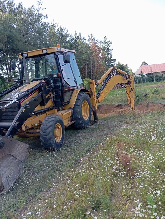 Usługi Koparko-ładowarką (CAT 428D)