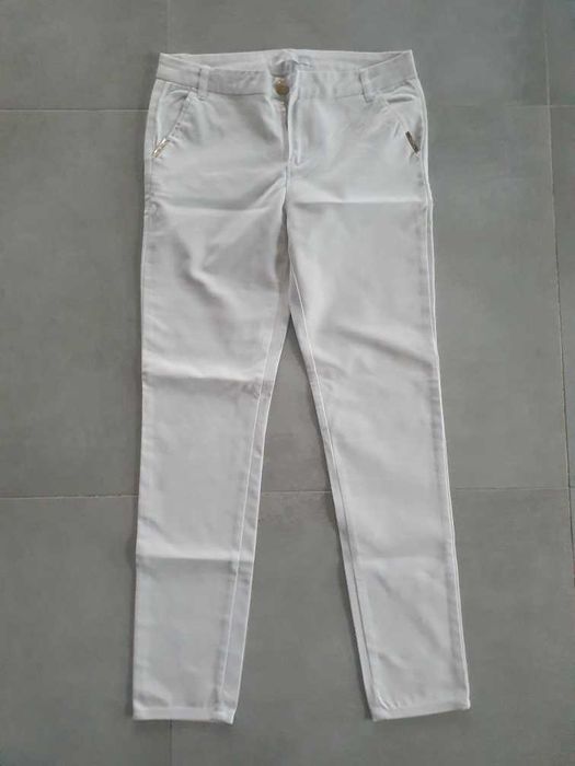 Białe eleganckie spodnie w rozm 40