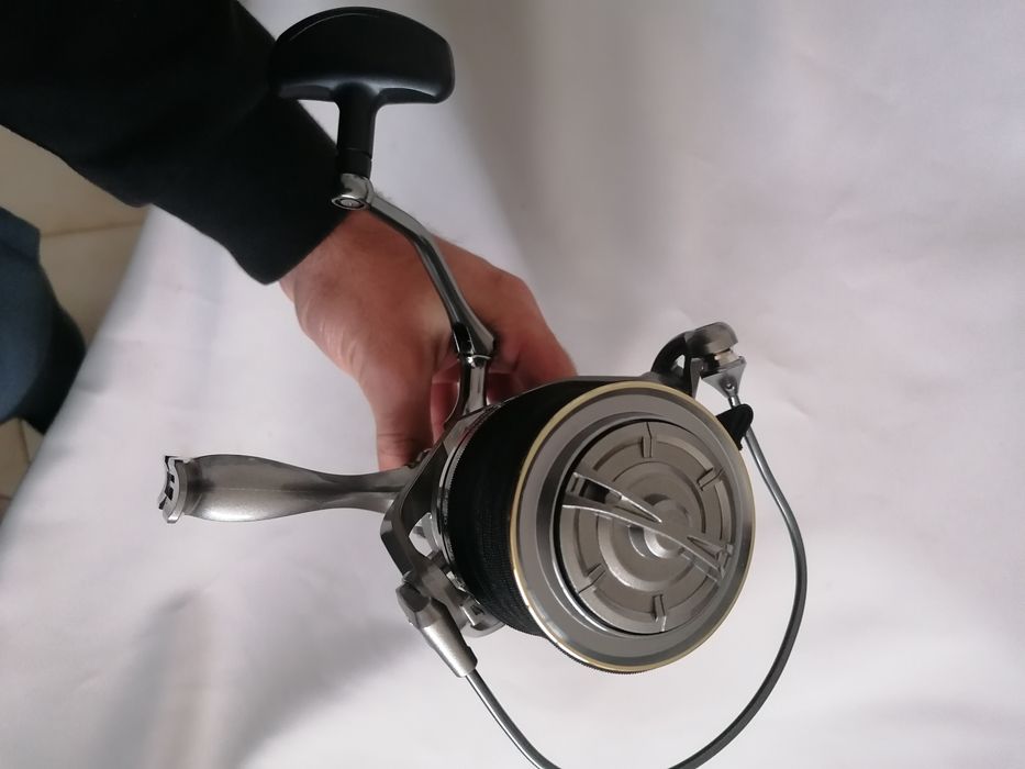 Carreto pesca novo com linha daiwa