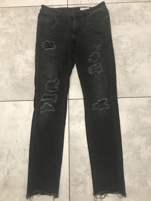 Jeansy Review z dziurami