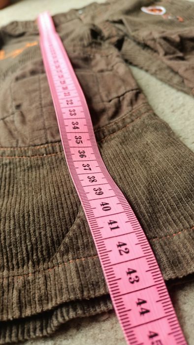 Brązowe spodnie sztruksowe rozm 80/86 early days