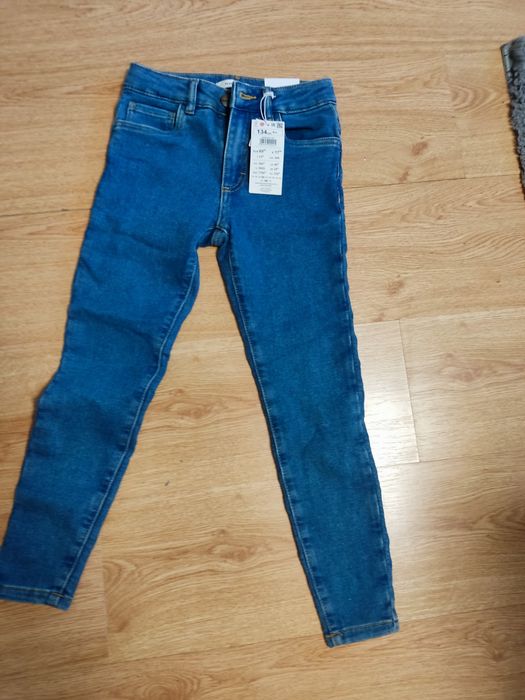 Nowe spodnie jeans dziewczęce 134 Reserved