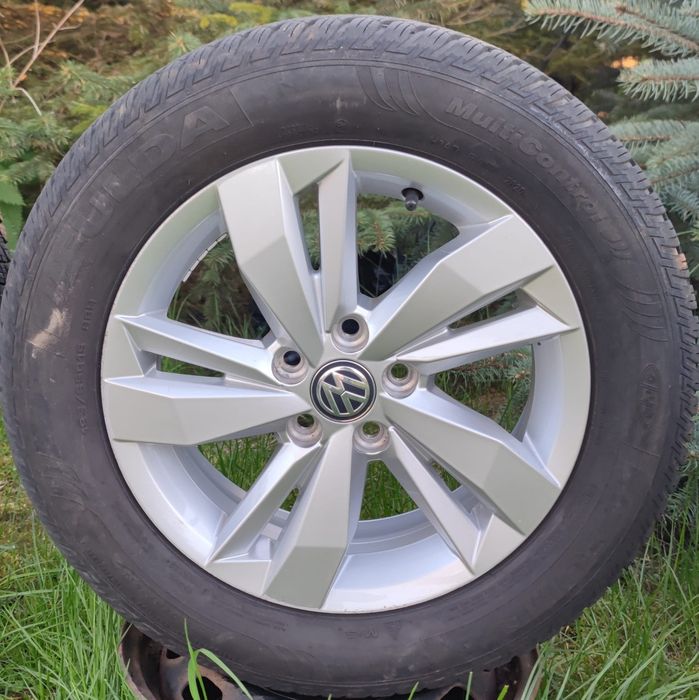 Felgi opony całoroczne 185/65R15 VW Polo Fabia Rapid 5x100 5,5x15 ET40