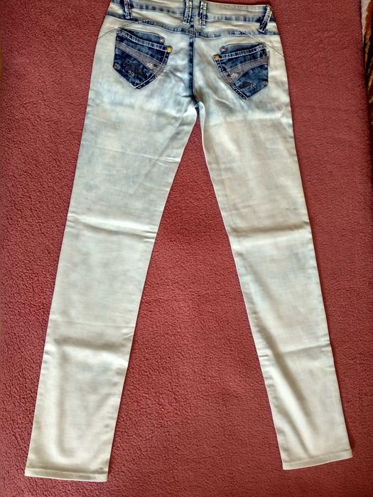 Джинси для дівчинки підлітка прямі стрейчеві жіночі блакитні 26 р.