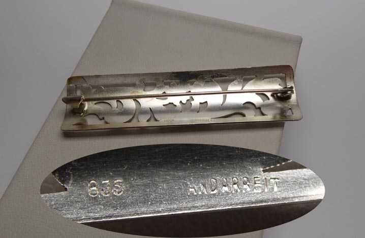 Srebrna broszka wycinane kwiaty handarbeit.