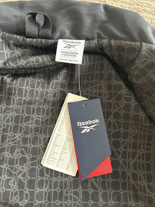 Жіноча вітрівка рібок