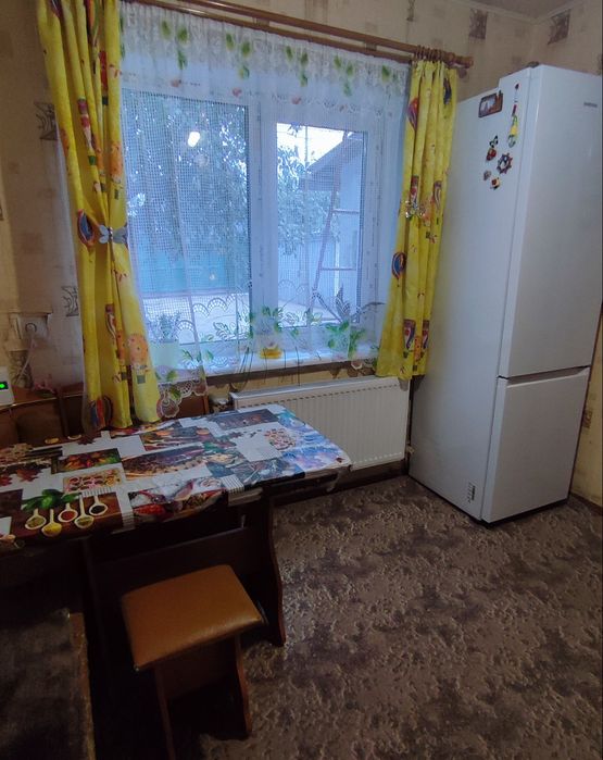 Продам в Харківській  обл, м.Балаклії 1/2 частку часного будинка