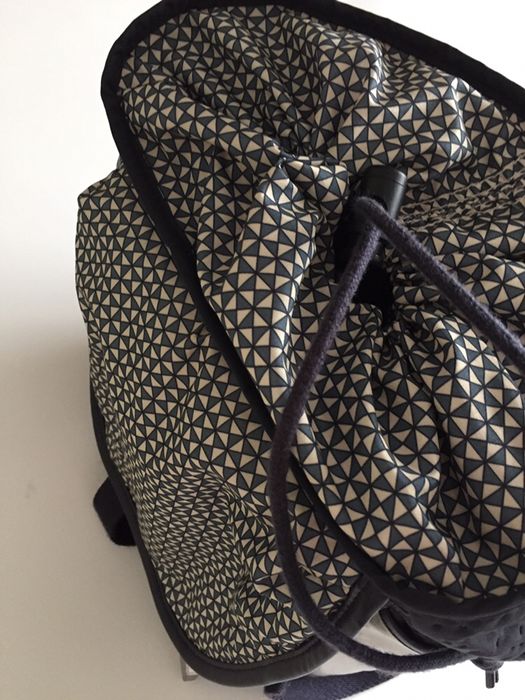 Mochila kipling azul e prateada