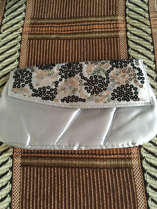 Подарунки сумки гаманці