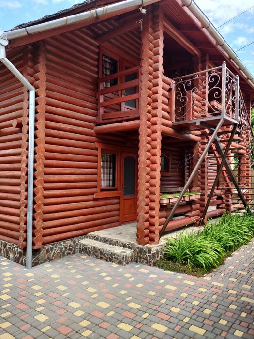 Проживання в дерев'яному будинку.