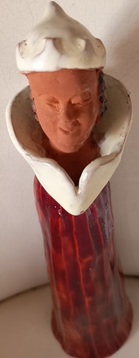 Boneco de barro feito a mão