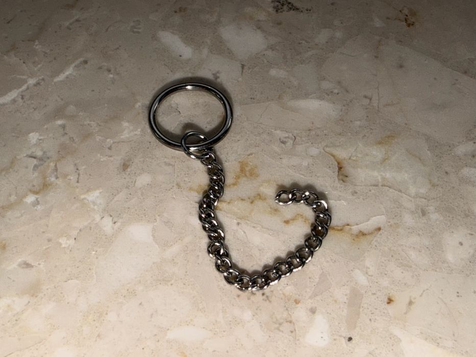Unisex kolczyk 10 mm piercing 16 G kółko segment Tytan