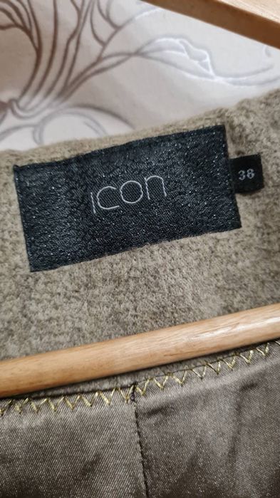 Пальто фирмы icon