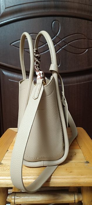 Сумка бежевого кольору