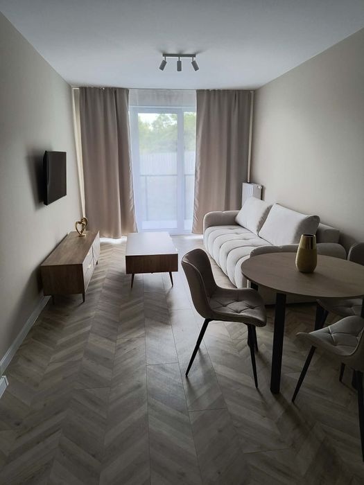 2 pokojowy apartament z miejscem postojowym i dwiema komórkami