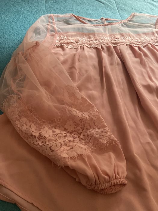 Camisola com mangas fluidas sem uso