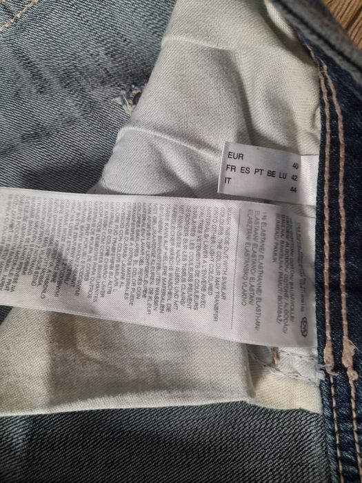 C&A jeansy damskie z przetarciami r.40