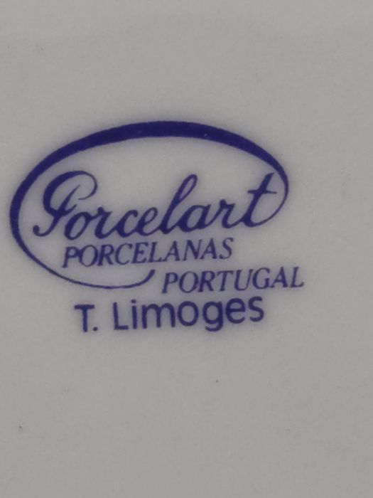 Conjunto de pratos em porcelana "Limoges".