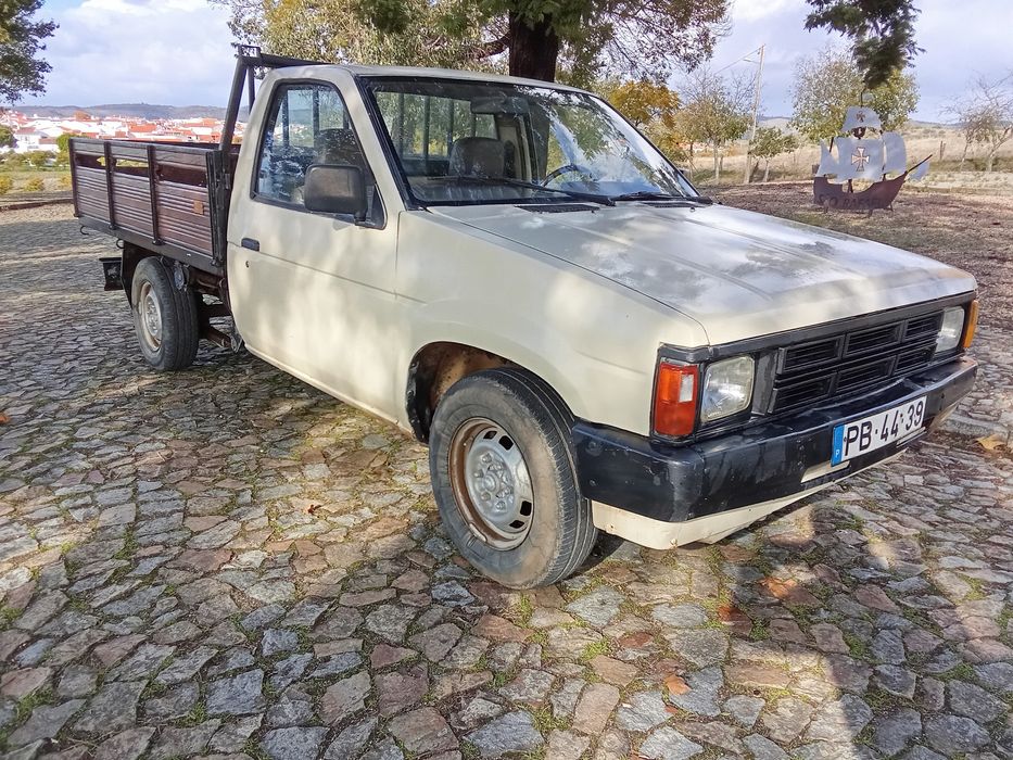 Vendo ou troco Nissan d21