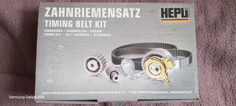 Продам комплект ремень грм з натяжним роликом ,та помпу