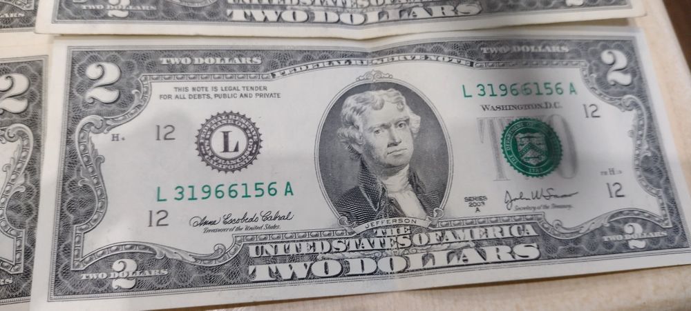 Продаж купюри 2 долара 2013; 2017  та 1  долар  2009.,2017