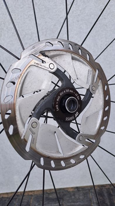 Uszkodzobe koło przednie DT Swiss PRC 1400 Spline